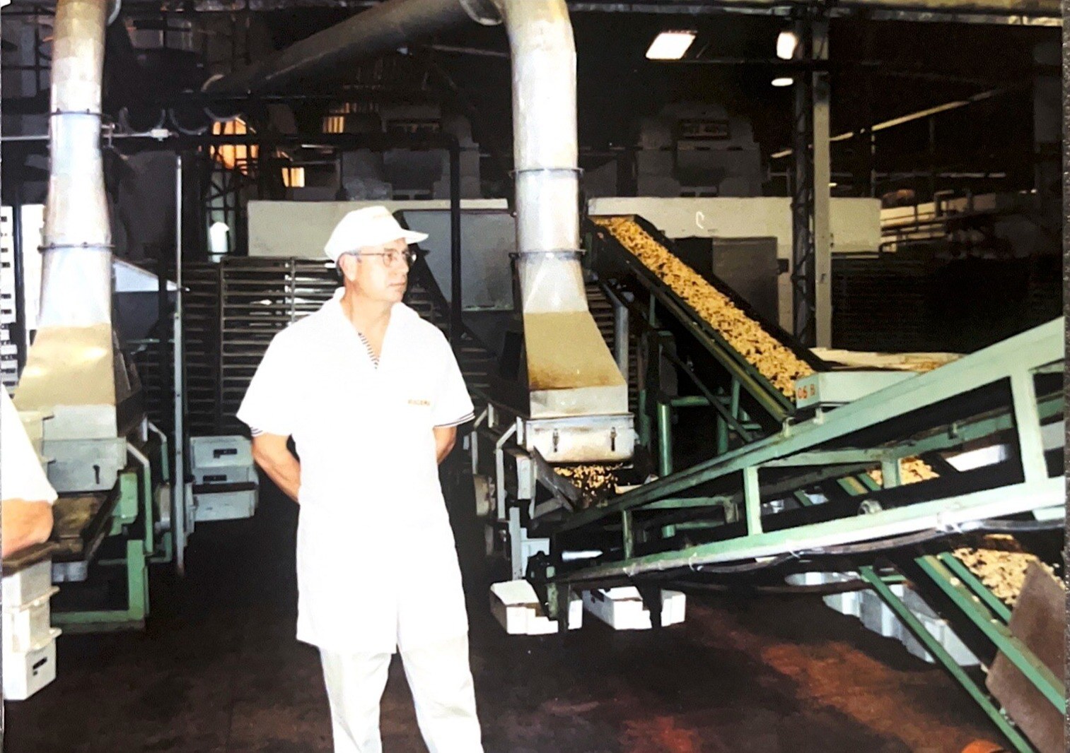 Jimmy standing in factory