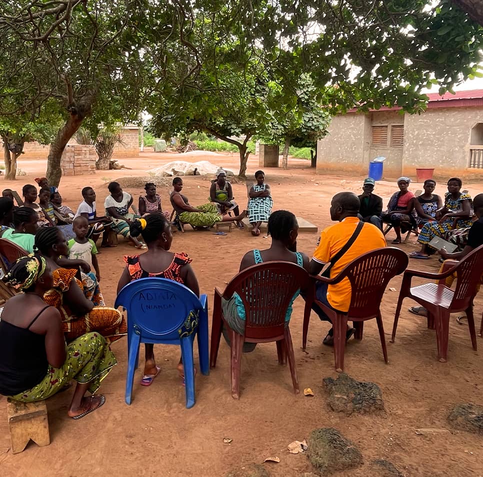 VSLA group sitting in a circle